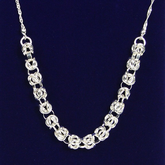 indulgence knotted links silver necklace