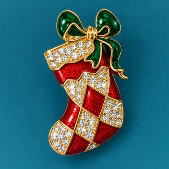 Indulgence Christmas stocking brooch with red enamel, green bow and sparkling crystals