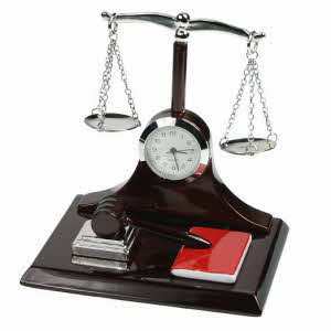 The scales of justice miniature clock