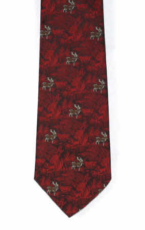 Red country tie with embroidered stags on a detailed woodland background